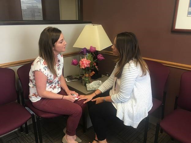 Pictured at right: Victim Witness Center Director Heather Prater